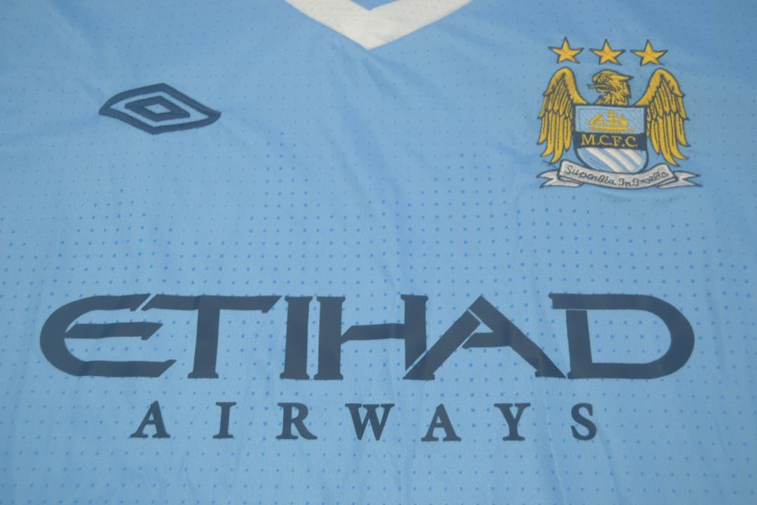Camisa Retrô Manchester City Home 11/12 "Kun Aguero" Nº16